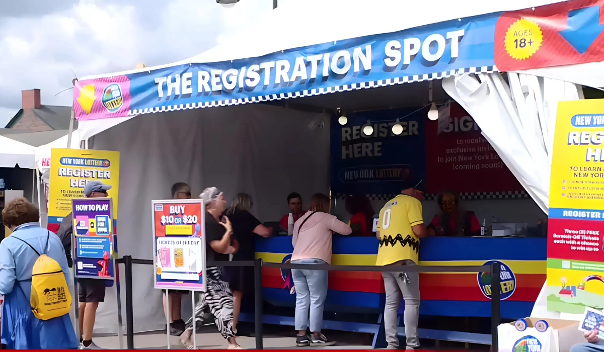 Fairgoers buying Powerball Tickets